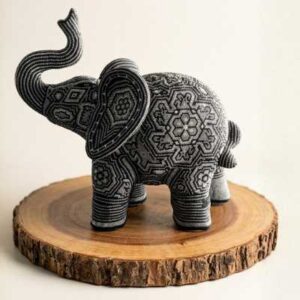 Elefante decorativo artesanal de alta gama con microchaquira huichola, figura de lujo monocromática.